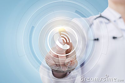 Doctor presses the call button. Stock Photo