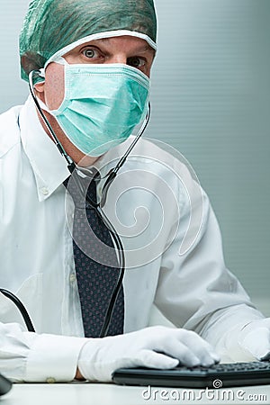 Masked doctor questions misinformation, considers ancient wisdom Stock Photo