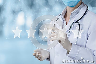 Doctor puts a rating on a virtual screen Stock Photo