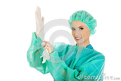 Doctor putting sterilized medical glove. Stock Photo
