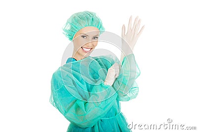 Doctor putting sterilized medical glove. Stock Photo
