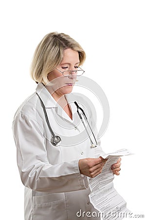 Doctor reading package insert Stock Photo