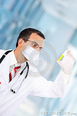 Doctor resarch a medical test glass with urine. Stock Photo