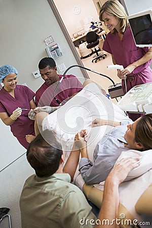 Doctor retrieving eggs from ovary using ultrasound Stock Photo