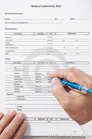 Doctor Reviewing Test Results Stock Photo