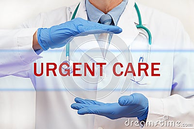 Doctor`s hands with URGENT CARE inscription Stock Photo