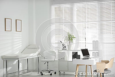 Doctor`s office interior with workplace in clinic Stock Photo