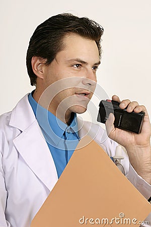 Doctor or scientist dictating Stock Photo