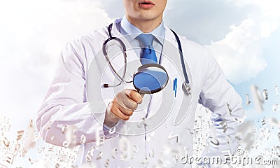 Doctor searching your diseases Stock Photo
