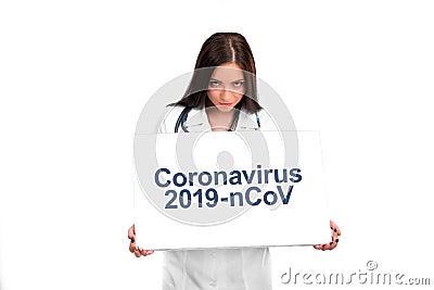 Doctor showing clipboard for text Stock Photo