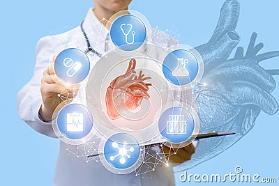 A doctor is showing a medical scheme consisting of a pulsing heart inside the circle of medical symbols . Stock Photo