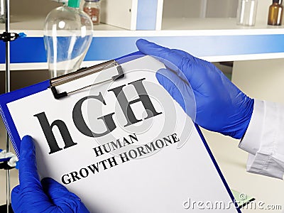 Doctor shows hGH Human growth hormone sign Stock Photo