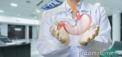The doctor shows stomach problems Stock Photo
