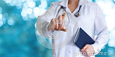 Doctor shows a tube with a cure. Stock Photo