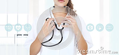 Doctor with a stethoscope in the hands and medical icons Stock Photo