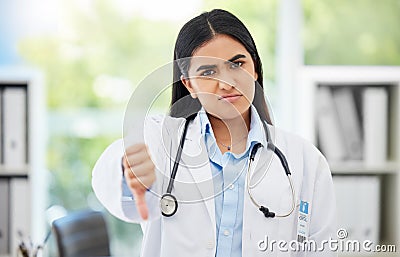Doctor, stop and thumbs down with medical healthcare professional in hospital consulting office. Fail, poor research, or Stock Photo