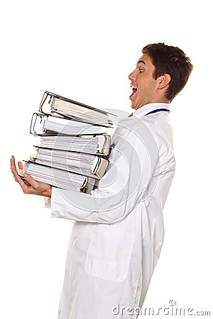 Doctor on stress with stacks of files. Bureaucracy Stock Photo