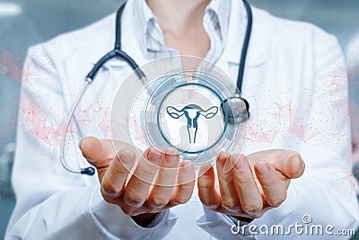 The doctor supports the uterus icon in hand Stock Photo