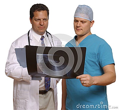 Doctor and surgeon reviewing x-ray Stock Photo