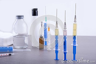 Doctor table with shots and disinfectant ready to use Stock Photo