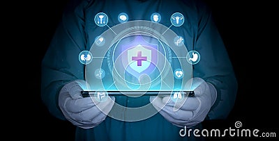 Doctor with tablet shows health insurance icon. Stock Photo