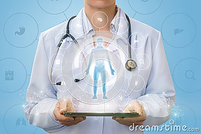 Doctor on the tablet shows a hologram of a man . Stock Photo
