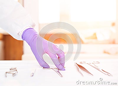 Doctor takes medical instruments from the table for the concept of transplantation of human organs and tissues, transplantology Stock Photo