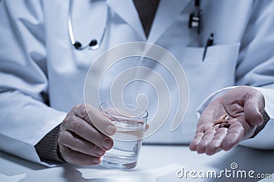 Doctor taking antidepressants Stock Photo