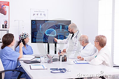 Doctor talking about brain activity Stock Photo