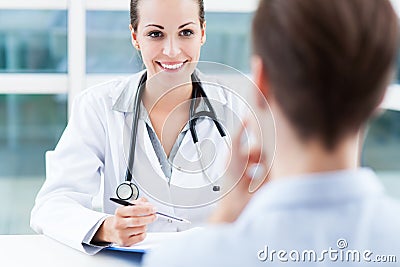 Doctor talking to patient Stock Photo