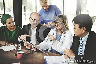 Doctor Team Treatment Plan Discussion Concept Stock Photo