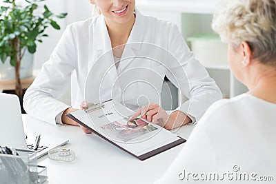 Doctor telling about diet plan Stock Photo