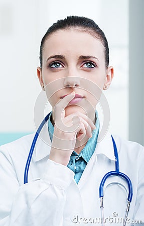 Doctor thinking Stock Photo