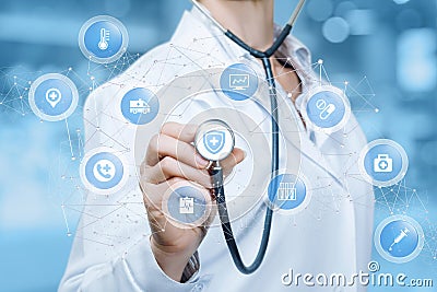 A doctor is touching a digital scheme of wireless connections containing small spheres with medical icons inside.The concept is Stock Photo