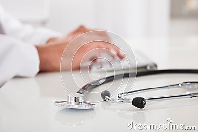 Doctor typing on keyboard Stock Photo
