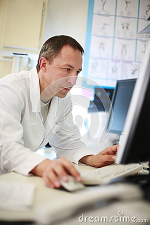 Doctor using computer Stock Photo