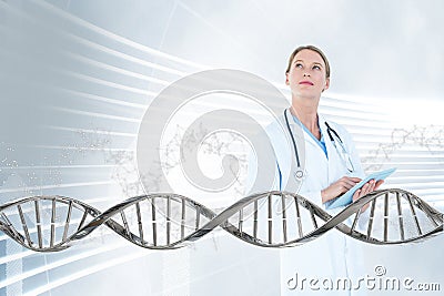 Doctor woman looking up with 3D DNA strand Stock Photo