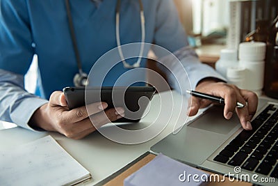 Doctor work on digital tablet healthcare doctor technology tablet using computer in office. Stock Photo