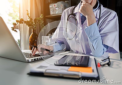 Doctor work on digital tablet healthcare doctor technology tablet using computer. Stock Photo