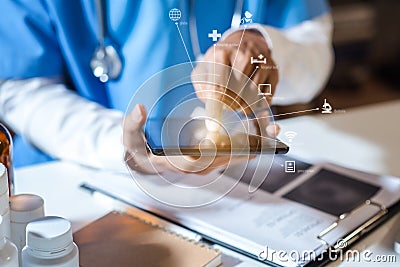 Doctor work on digital tablet healthcare doctor technology tablet using computer in office. Stock Photo