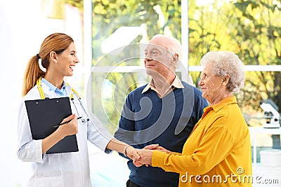 Doctor working with elderly patients Stock Photo