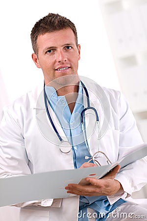 Doctor working at office Stock Photo