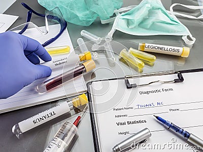 Doctor working with samples of contagious diseases in a clinical Stock Photo