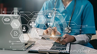 Doctor working on tablet and medical stethoscope on clipboard on desk, electronics medical record system EMRs concept Stock Photo