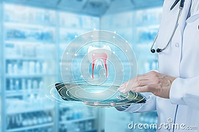 Doctor works with the tooth model in the tablet . Stock Photo