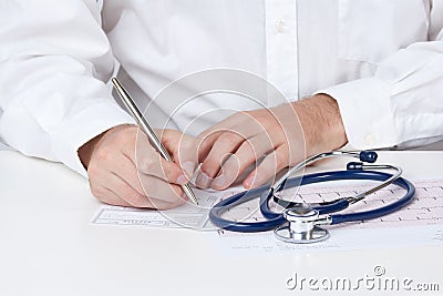 Doctor write recipe Stock Photo