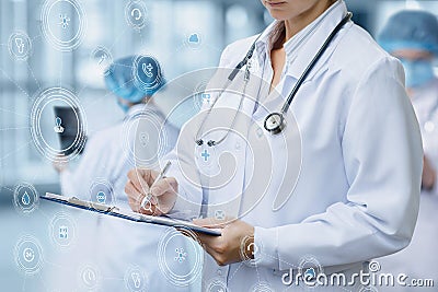 Doctor writes a diagnosis Stock Photo