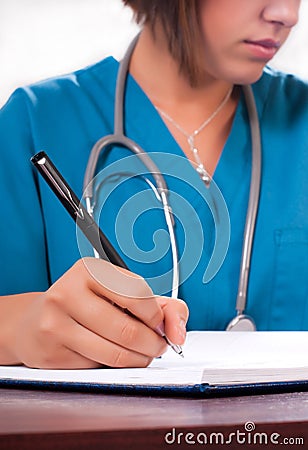 Doctor writing Stock Photo