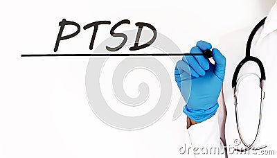 Doctor writing word PTSD Medical concept on white background Stock Photo