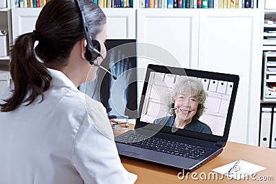 Doctor x-ray laptop patient telehealth Stock Photo